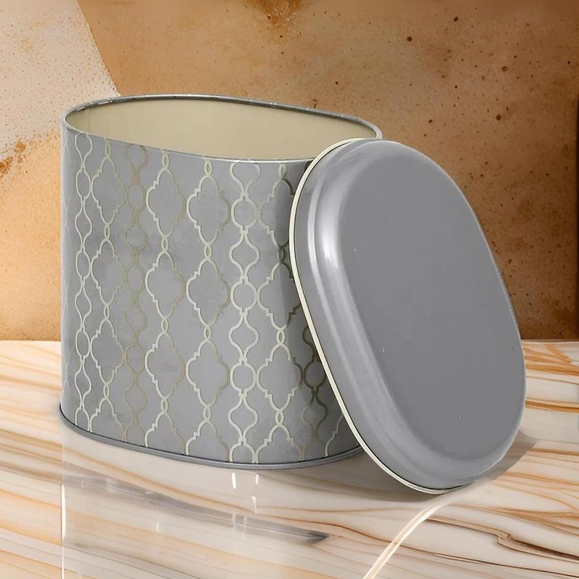 Oval Metal Tin – 140 x 120 x 130 mm (1.4L)  gold geometric pattern black background